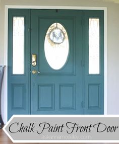 the front door is painted teal green