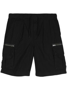 black cotton twill weave mid-rise drawstring waist slip pockets to the sides two side zip-fastening pockets two side cargo pockets two rear flap pockets knee-length Techwear Cargo Shorts With Multiple Pockets, Techwear Cargo Shorts With Cargo Pockets, Utility Cargo Shorts With Multiple Pockets, Urban Style Cargo Shorts With Pockets, Black Techwear Shorts With Cargo Style, Black Utility Shorts With Multiple Pockets, Black Cotton Cargo Shorts With Functional Pockets, Cotton Techwear Shorts With Multiple Pockets, Black Knee-length Cargo Shorts With Pockets