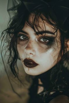 22 Grungy Makeup Looks That Will Rock Your World Scary Black Eye Makeup, Theatre Makeup Looks, Zombie Fairy Makeup, Crow Eye Makeup, Dark Undereyes Makeup, Vein Eye Makeup, Goth Queen Makeup, Messy Black Makeup, Circus Master Makeup