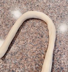 a long white object sitting on top of a counter