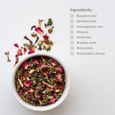 a white bowl filled with different types of tea and ingredients to make it into a recipe