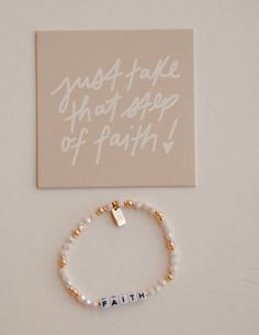 Details Beaded Stretch Bracelet 6.75" before stretch, size fits most Verse Reference on Attached Gold Tag Inspired by verse 2 Corinthians 5:7“For we live by faith, not by sight.” Made in USA White Hypoallergenic Rosary Bracelet For Everyday, Everyday Hypoallergenic White Rosary Bracelet, Everyday White Hypoallergenic Rosary Bracelet, Meaningful Beaded Stretch Bracelet For Friendship, Inspirational White Bracelet With 8mm Beads, Everyday White Beaded Rosary Bracelet, White Inspirational Stretch Bracelet With 8mm Beads, Inspirational Stretch Bracelet With 8mm Round Beads, White Spiritual Stretch Bracelet With Letter Beads