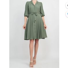 Prairie Sage (Soft Green) Button Up Tie Waist Dress Lined With A Fully Removable Matching Green Slip That Is Secured With Two Button Straps Lightweight And Flowing 14 Inches Across Waist 25 Inches From Waist To Hem Spring Solid Knee-length Shirt Dress, Solid Spring Knee-length Shirt Dress, Spring Solid Color Knee-length Shirt Dress, Knee-length Daywear Dresses With Button Cuffs, Semi-formal Button-up Dress With Button Cuffs, Daywear A-line Shirt Dress, Solid A-line Shirt Dress For Daywear, A-line Shirt Dress For Daywear, Spring Semi-formal Mini Shirt Dress