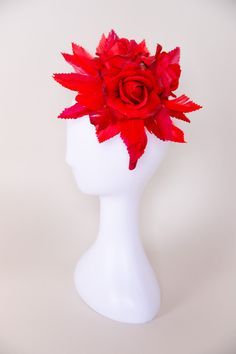 A sinamay disc embellished with three faux roses surrounded by beautiful faux red feathers. NO RETURNS/EXCHANGES due to the nature of the product (special occasions and headwear). Not all screens/lighting are created equal. Make sure you are happy with the color match before ordering! If you have any concerns, let us know! Sinamay, Faux Flowers, Faux Feathers, Satin Headband All Sales Final on Hats and Fascinators. Colors may vary on different devices. Red Feather Headpiece For Kentucky Derby, Red Feathered Headpiece For Kentucky Derby, Red Summer Fascinator With Handmade Flowers, Summer Red Fascinator With Handmade Flowers, Red Handmade Flowers Fascinator For Summer, Red Handmade Flowers Fascinator For Wedding, Red Wedding Fascinator With Handmade Flowers, Red Headpieces With Handmade Flowers For Evening, Red Handmade Flowers Fascinator For Spring