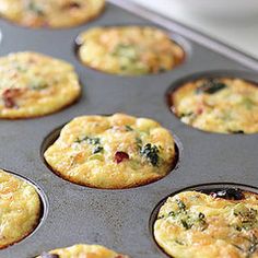 a muffin tin filled with lots of different types of food