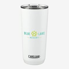 the blue lake resort tumbler is white and has a green logo on the side