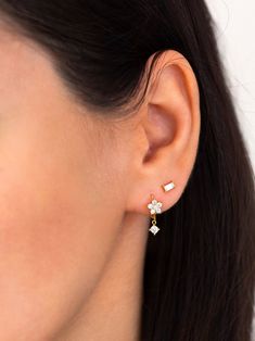 "These minimalist tiny baguette studs look beautiful with everything. An everyday staple piece, perfect for wearing in a second or third earhole or all by themselves for a dainty addition to your look. ∙ Sold individually (1 stud) or as a pair (2 studs). Both options are available on the dropdown menu. * D E T A I L S * ∙ Material: .925 Sterling Silver or 18K Gold Plated over .925 Sterling Silver ∙ Stone: Cubic zirconia ∙ Dimensions: 5mm x 2mm ∙ Hypoallergenic & nickel-free * P A C K A G I N Dangle Stud Earrings, Dangle Earrings With Baguette Diamonds For Gift, Baguette Diamond Drop Earrings For Gift, Minimalist Earrings With Baguette Diamonds, 2nd Ear Piercing, Cartilage Helix Piercing, Baguette Diamond Earrings, Second Hole Earrings, Small Earrings Gold