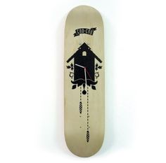 a skateboard with an image of a house on the front and clock on the back