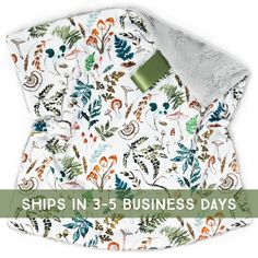 a white shirt with colorful flowers and plants on it that says ships in 5 - 5 business days