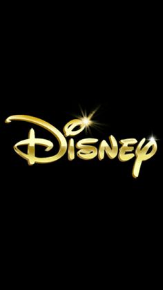 the logo for disney is shown in gold on a black background with stars and sparkles