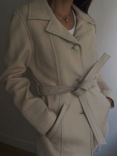 "Beautiful Vintage Cream Belted Leather Blazer Trench Jacket 100% Leather | 1990s | Buttery Soft Leather | Minimal Style Beautiful cream leather jacket with a belted waist for an optional cinched look. This amazing piece has a notched collar, front button closure,  an inner lining for a comfortable fit. Marked size: xs Color: cream 100% leather (super soft) Recommended for size xs-m, depending on the desired drape. Modeled on a small frame, 5'4 height. Please refer to the measurements listed below: underarm to underarm: 19\" / shoulder to shoulder: 16\" / arm length: 22\" / shoulder to hem: 27.5\" Condition: in gorgeous vintage condition All sales are final." Spring Leather Jacket With Belt Loops For Work, Fitted Leather Jacket With Belted Cuffs, Fitted Leather Outerwear With Belt, Chic Leather Outerwear With Belt, Classic Leather Jacket With Belted Cuffs For Fall, Chic Leather Jacket With Belt For Work, Spring Leather Jacket With Belted Cuffs And Long Sleeves, Spring Leather Jacket With Belted Cuffs, Elegant Spring Leather Jacket With Belt