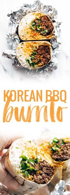 the korean bbq burrito is being held up by someone's hand and has been