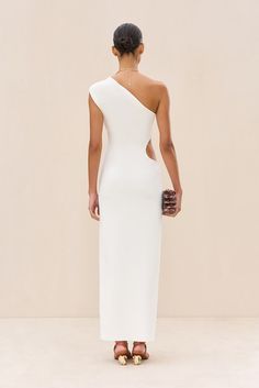 A sleek knit asymmetrical maxi dress with a right waist cutout. — Maxi length — Viscose and jersey blend — Slight stretch — Right waist cutout Asymmetrical Maxi Dress, Platform Flats, Evening Sandals, Knit Set, Cozy Fall, Winter White, Denim Top, Kids' Dresses, Set Dress