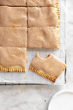 several pieces of pie sitting on top of a baking sheet