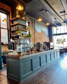 the interior of a coffee shop with lots of counter space