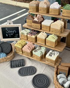 soaps are on display at an outdoor market