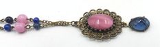 "Vintage brass chain and pink blue glass cabochon pendant necklace, In good vintage condition. Necklace 23\" long. Pendant 2\" x1\". Pink beads 7 mm. Blue beads 4 mm. Pink cabochon 17 mm x 13 mm. Blue cabochon 15 mm x 10 mm. Thanks." Vintage Pink Oval Necklace, Formal Pink Cabochon Necklace, Vintage Pink Oval Pendant Jewelry, Antique Handmade Pink Necklaces, Antique Handmade Pink Necklace, Pink Antique Handmade Necklace, Handmade Pink Antique Necklace, Pink Cabochon Necklaces For Jewelry Making, Swarovski Brooch