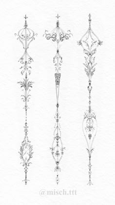 four different types of ornamental designs in black and white ink on watercolng paper