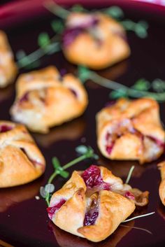 small cranberry filled pastries on a plate