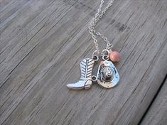 Cowgirl Necklace with Cowboy boots, cowboy hat and accent bead in your choice of colors Western Style Necklaces For Western-themed Events, Adjustable Western Necklaces For Rodeo, Adjustable Western Necklace For Rodeo, Adjustable Western Style Necklace For Rodeo, Handmade Western Style Necklace, Nickel-free Western Jewelry For Western-themed Events, Cowgirl Necklace, Boot Charm, Cowgirl Necklaces