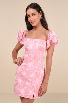 Impress everyone will how adorable you are in the Lulus Momentous Cuteness Pink Jacquard Floral Puff Sleeve Mini Dress! Lightweight woven floral jacquard shapes this darling dress that has short puff sleeves (with elastic at the cuffs and shoulders) that frame an off-the-shoulder neckline. The princess-seamed bodice has a high, fitted waist and tops a skirt with a figure-skimming fit. Mini hem (with a side notch) completes the look. Hidden zipper/clasp at back. Fit: This garment fits true to siz Pink Hoco Dress With Sleeves, Short Sleeve Hoco Dress, Puff Sleeve Hoco Dress, Spring Fling Dresses, Spring Fling Dress, Puff Sleeve Mini Dress, Hoco Dress, Pink Mini Dress, Petal Sleeve