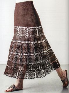 This is the crochet pattern for a long motif skirt.  This pattern is for a sizes small, medium, large, extra large, 2X, 3X, 4X and 5X.   This beautiful skirt is made up of various motifs and a lacy pattern and the result is a stunning, well fitting skirt that is perfect for many occasions. This pattern is for the advanced skill level crocheter. The two lace sections are created from a chart, please see the photos section for a small section of the chart.  Also in the photos section, you will find the size measurements and materials list.   You will need crochet hooks sizes 5 and 7 plus crochet cotton size 10.   This PDF crochet pattern will include a photo and Easy-to-Read instructions. This is an original crochet pattern; not a hand-crafted piece of apparel. No physical item will be shipp Crochet Maxi Skirt Chart, Granny Square Skirt Schematic, Long Skirts Crochet, Crochet Granny Square Long Skirt, Skirt Crochet Pattern, Maxi Skirt Pattern, Designer Crochet, Skirt Crochet, Crochet Skirts