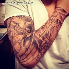 a man with a tattoo on his arm