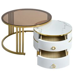 a white and gold coffee table with two round tables