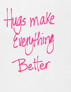 the words hugs make everything better written in pink on a white paper with red ink