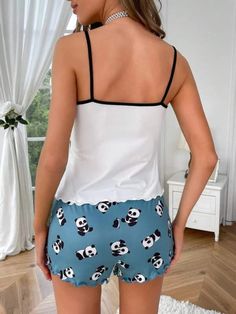 Elevate your loungewear with our Panda And Letter Graphic Contrast Binding Shorts Set. This 2-piece short set combines charming cartoon and letter graphics with delicate lettuce trim and contrast binding. Crafted for both comfort and style, the set includes a sleeveless top and regular-fit shorts, boasting a touch of semi-sheer allure. Features: Pattern Type: Cartoon, Letter Type: Short Sets Details: Lettuce Trim, Contrast Binding Sleeve Length: Sleeveless Fit Type: Regular Fit Number of Pieces: Trim Contrast, 2 Piece Short Set, Types Of Lettering, Short Set, Sheer Fabrics, Shorts Set, Workout Shorts, Lettuce, Short Sets