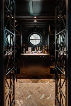 a wine cellar with lots of bottles in it