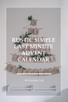 a white christmas tree with the words rustic simple last minute advent calendar