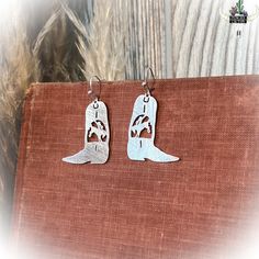 Western Earrings | Punchy Cactus | Western Boutique | Dangle Earrings | Dangle Boot Earrings | Boot Earrings | NFR | Rodeo | Nfr Rodeo, Boot Earrings, Cactus Western, Texas Fashion, Earrings Western, Silver Boots, Western Boutique, Western Earrings, Trending Necklaces