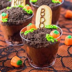 halloween graveyard cupcakes with chocolate frosting and sprinkles on top