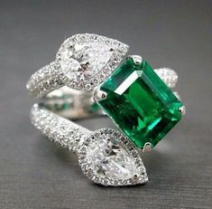 Exquisite Green Diamond Ring Luxury, Unique Emerald Ring With Accent Stones For Formal Occasions, Unique Formal Emerald Ring With Accent Stones, Luxury Emerald Ring With Vs Clarity As Gift, Luxury Emerald Ring With Vs Clarity For Gift, Luxury Green Diamond Ring With Vs Clarity, Pear Cut Diamond Ring, Pear Diamond Rings, Black Gold Jewelry