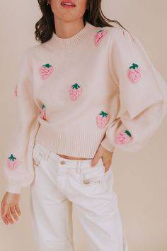 Get ready to add some sweetness to your wardrobe with our Strawberries And Cream Sweater! Made with a soft knit material, this tulle pink colored sweater features ribbed cuffs, hemline, and neckline for ultimate comfort. And don't forget the adorable 3D pink and green strawberries that add a playful and unique touch. (You'll definitely "berry" the competition with this one!) Details Tulle pink colored sweater Soft knit material Ribbed cuffs hemlin, and neckline 3D pink and green strawberries Lon Cute Strawberry Sweater, Green Strawberries, Tulle Pink, Nursing Friendly Dress, Green Strawberry, Plus Jumpsuit, Exclusive Dress, Basic Dress, Cream Sweater