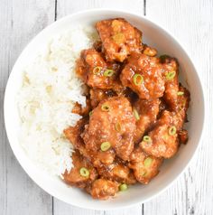 a white bowl filled with meat and rice