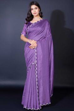 Elevate your elegance with this Designer Khadi Shimmer Saree, a perfect blend of traditional charm and modern allure. Crafted from luxurious Khadi Shimmer fabric, this saree features exquisite border work that gracefully frames the drape, adding a touch of sophistication to every pleat. The matching blouse, also in Khadi Shimmer, complements the saree for a seamless, radiant look. Slight color variations may occur due to digital imaging. Accessories shown are for styling purposes only and not in Shimmer Saree, Sequins Saree, Fancy Fabric, Party Wear Lehenga Choli, Gorgeous Blouses