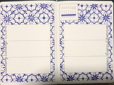 an open notebook with blue and white designs on the pages, which are lined in two rows