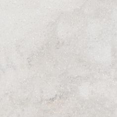 a white marble background with small speckles