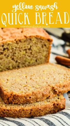 a loaf of yellow squash quick bread on top of a towel with cinnamon sticks in the background