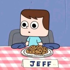 a cartoon character sitting at a table with cookies on it and the words jeff spelled in front of him