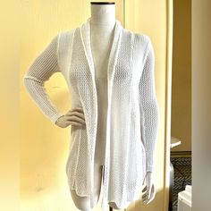 The Perfect Summer Sweater!!! This Cardigan Is Made Of A Light Mesh Knit. It Has A Very Figure Flattering Shape. Nwot Open Knit Cardigan For Layering, Cozy Stretch Knit Cardigan, Lightweight V-neck Cardigan For Fall, Lightweight Long Sleeve Winter Cardigan, White Knitted Outerwear For Layering, White Knitted Outerwear For Cold Weather, Lightweight Long Sleeve Cardigan For Layering, Casual Stretch Knit Cardigan, Lightweight Open Front Cardigan For Layering