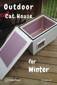 an outdoor cat house for winter on a deck with the words, outside cat house for winter