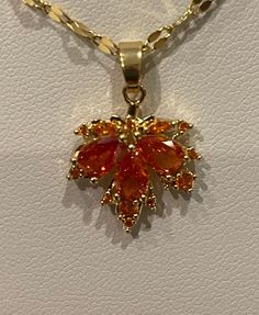 Red maple leaf pendant, necklace,  inlaid zircon, gold plated Comes complete with a SS goldenchain and a velvet gift bag beautiful gift for any occasion Pendant height and width: 1.5 cm stainless steel Chain length 40-45 cm/15.75-17.75 inches Please have a look at the other items in my store. I ship all multi-item purchases in the same package. You will only be charged for the actual shipping cost if applicable. I will issue a credit to your payment method for any overcharge in shipping.  If you Red Maple Leaf, Red Maple, Art Deco Pendant, Small Cards, Leaf Pendant, Steel Chain, Stainless Steel Chain, Maple Leaf, Leather Cord