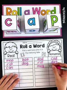 roll and word cards with the words roll a word on them