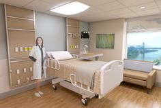 a woman standing next to a hospital bed