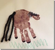 a child's drawing of a horse with long black hair and braids on it