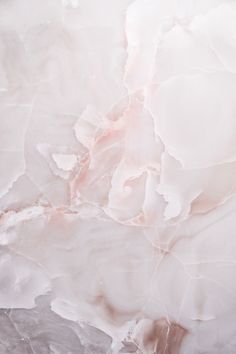 an abstract marble background with pink and white colors