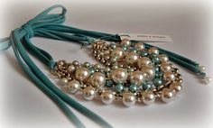 a bunch of pearls are attached to a cord